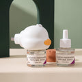 Evasri Cat Calming Diffuser Kit with one plug-in diffuser and two 40 ml refills