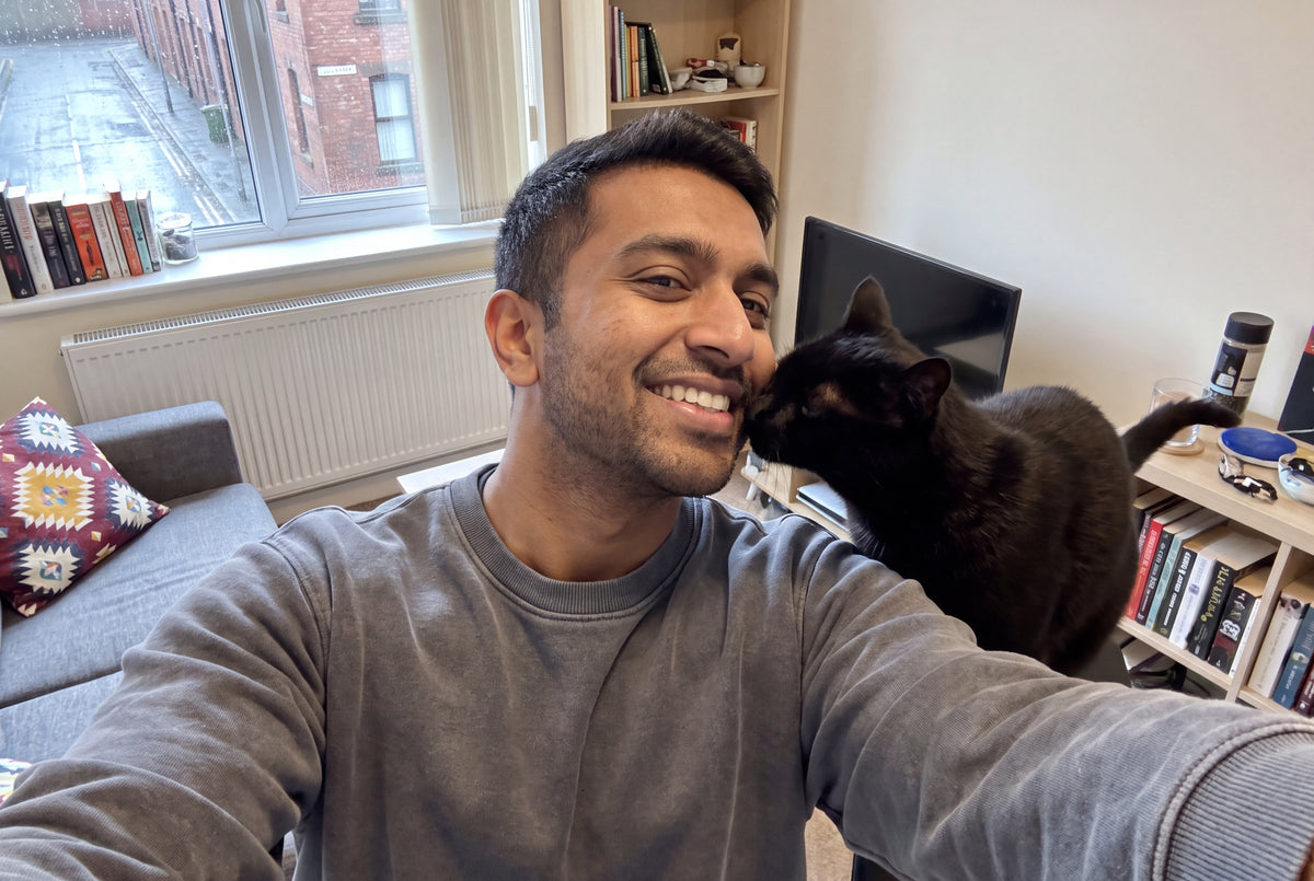 Lifestyle image of a cat owner in a UK home 4